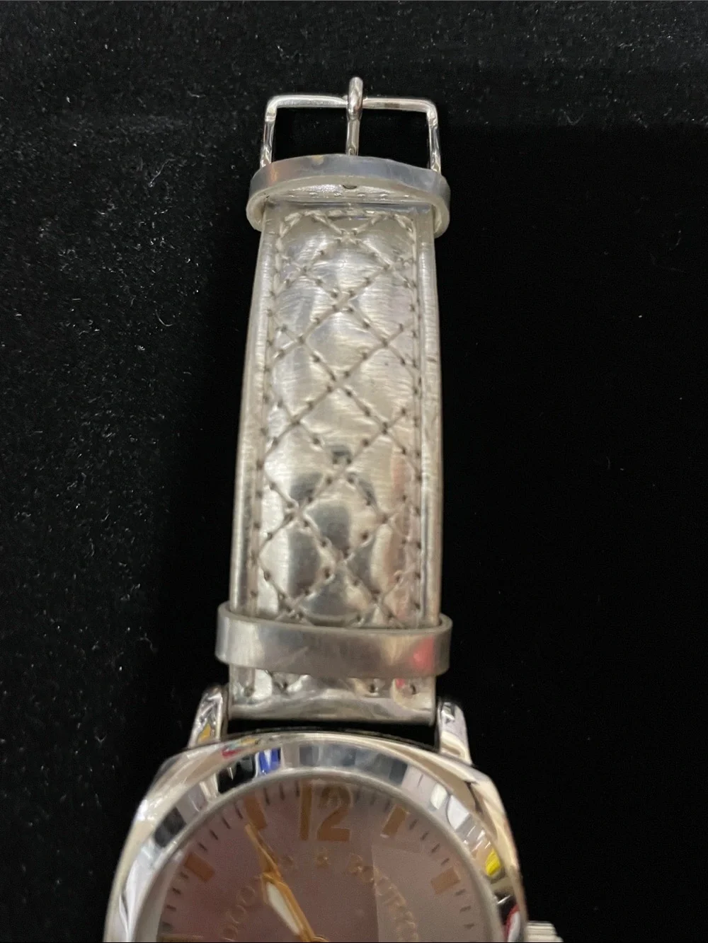 Dooney & Bourke Silver Quilted Leather Strap Watch with Gold Accents.